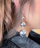 Watch th eball drop silver earrings