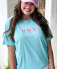 embroidery bow trio comfort colors tee close up