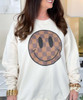 brown checkered smile sweatshirt close up