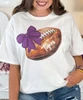 football with bow tee purple close up