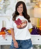 football with bow maroon tee