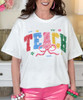 teach with bow tee close up
