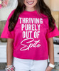 distressed thriving purely out of spite tee close up
