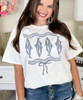 fish trio with bow tee close up