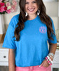 heathered monogrammed shirt close up