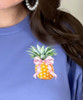 pocket pineapple with bow tee close up view