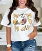 customized footballs and bows tee gold close up