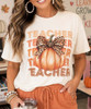 teacher pumpkin with bow tee model image close up