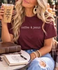 coffee and jesus tee maroon model image close up