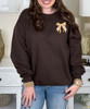 pocket grateful bow sweatshirt close up