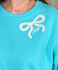 monogrammed pocket faux yarn bow sweatshirt close up of monogram
