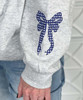 navy gingham fishtail monogram with bow on sleeve sweatshirt close up of bow on sleeve