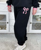 pink bow sweatshirt and sweatpant set close up of sweatpants