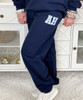 distressed blue check monogrammed sweatshirt and sweatpants set close up of sweatpants