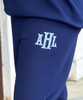 light blue gingham fishtail monogram sweatshirt and sweatpants set close up of monogram on sweatpants