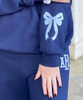 light blue gingham fishtail monogram sweatshirt and sweatpants set close up of bow on sleeve