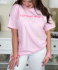 a little bit dramatic tee light pink tee close up