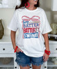 hey batter baseball with bow tee close up
