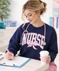 pink gingham nurse with bow navy model image