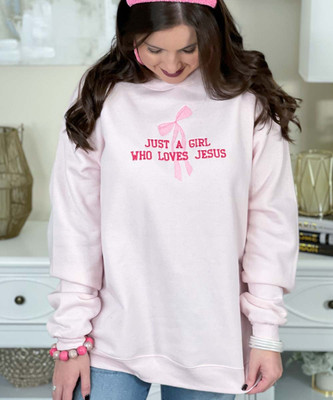 embroidered just a girl who loves jesus sweatshirt close up
