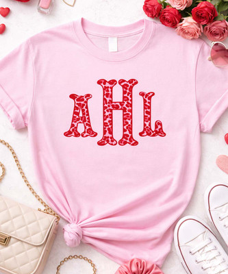 red and pink leopard fishtail monogram flat lay