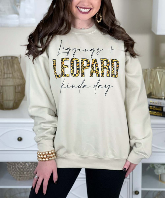 leggings and leopard kinda day sweatshirt close up