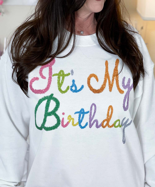 faux tinsel it's my birthday sweatshirt close up