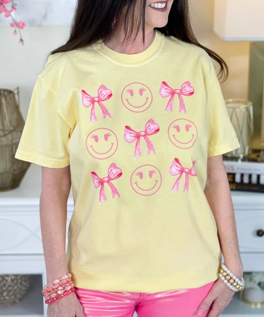 Smiley and bows comfort colors tee close up