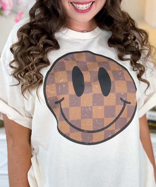 brown checkered smile tee close up