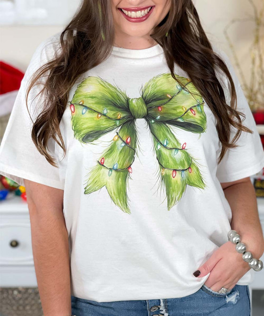 green bow with lights tee close up