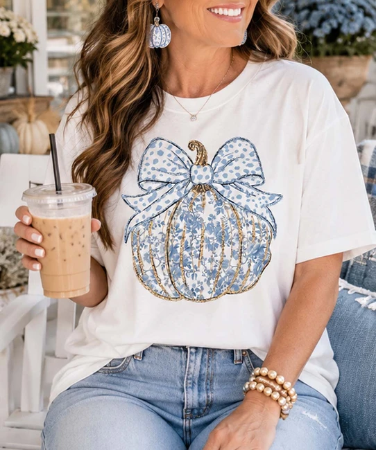 blue floral pumpkin with bow tee model image close up