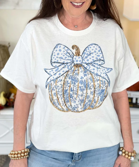 blue floral pumpkin with bow tee close up