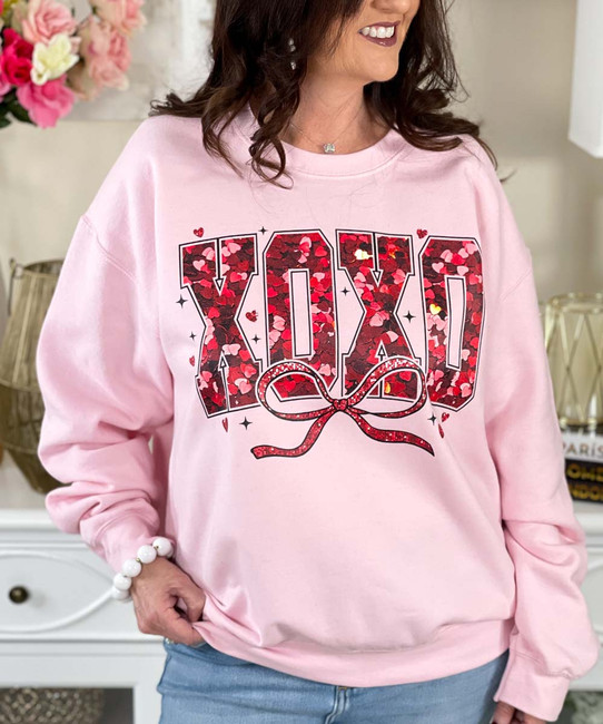 faux sequin xoxo with bow sweatshirt close up