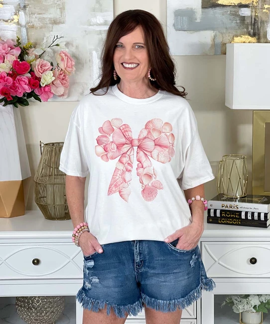 pink shell with bow tee