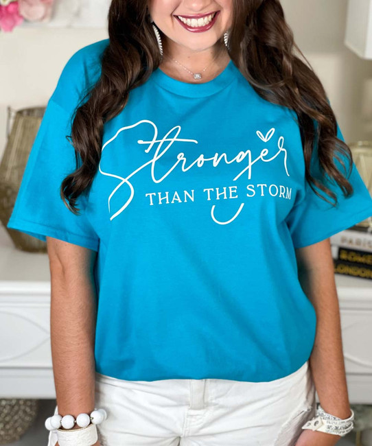 stronger than the storm tee close up