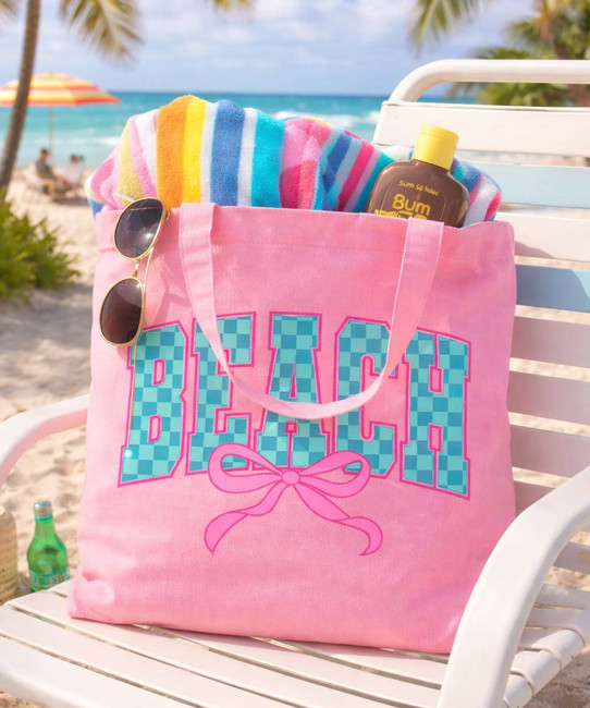 checkerboard beach with bow tote bag
