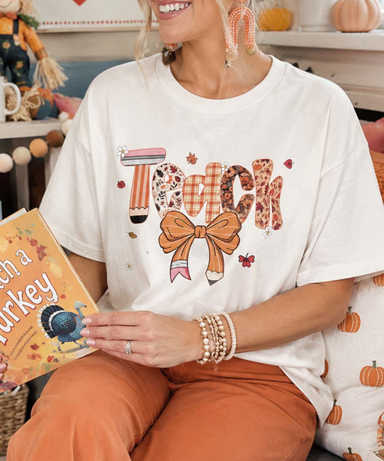 fall teach with pencil bow tee model image close up