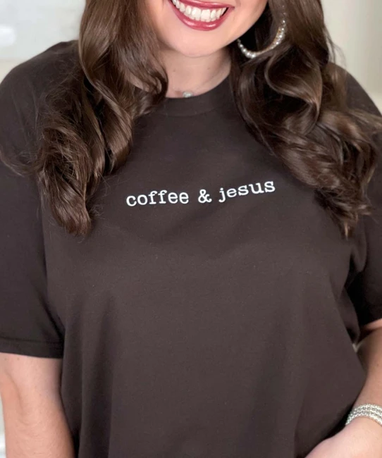 coffee and jesus tee close up to words