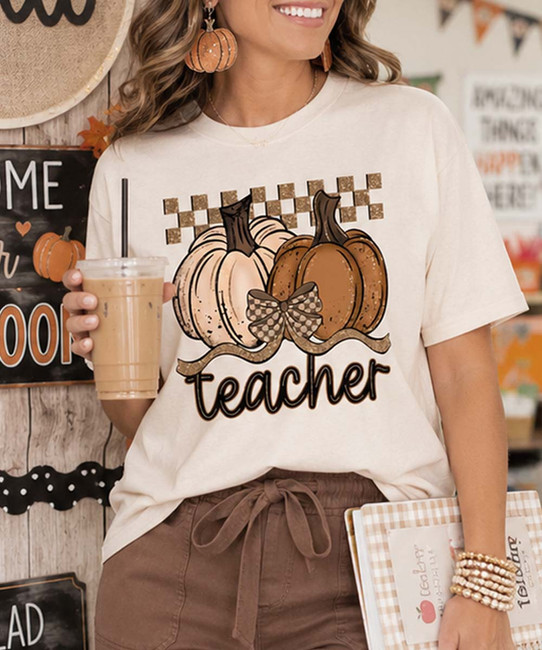 checkerboard pumpkin teacher tee model image close up