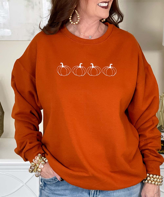 embroidered pumpkin sweatshirt close up