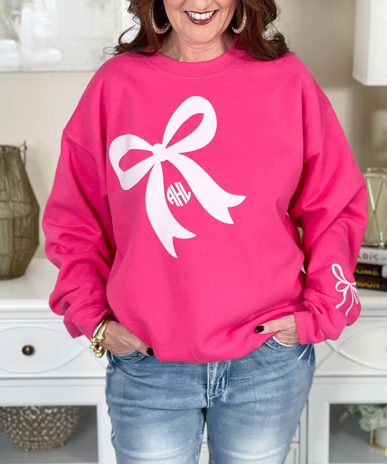 monogrammed white bow with bow on sleeve sweatshirt close up view