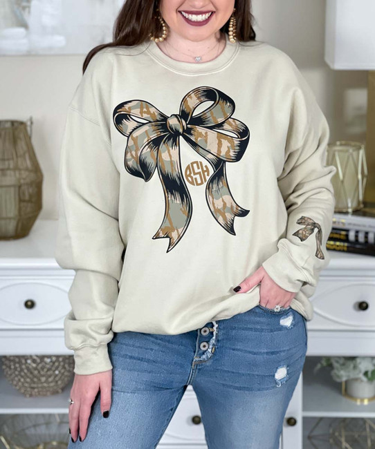 monogrammed camo bow with bow on sleeve sweatshirt close up