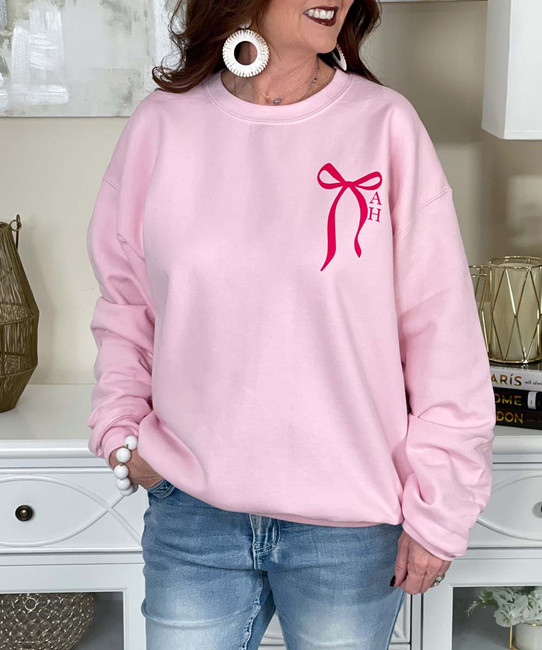 bow with stacked monogrammed sweatshirt close up