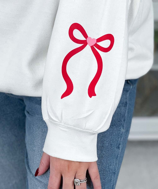 mama with bow and sleeve bow sweatshirt close up of sleeve