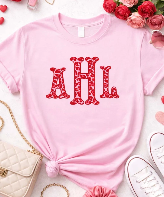 red and pink leopard fishtail monogram flat lay
