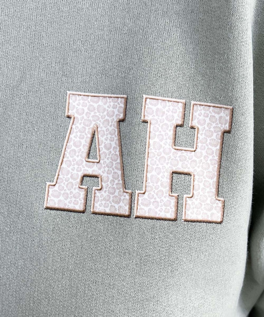 light leopard monogram sweatshirt close of the leopard monogram