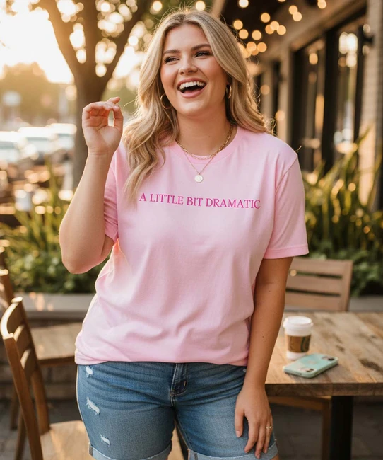 A little bit dramatic graphic tee light pink model