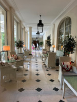 Long corridors and soft symmetry, leading through the understated calm of the hotel.