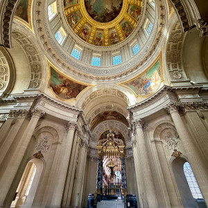 Beneath the monumental dome, soaring columns, marble details and painted ceilings reveal the grandeur of one of Paris's most impressive church interiors.