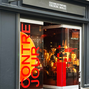 Frédéric Malle boutique interior in Paris — minimalist displays, signature perfumes, and modern fragrance artistry.